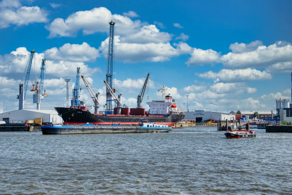 Industrial harbor hub representing the Ecomm Prime Global worldwide logistics network.